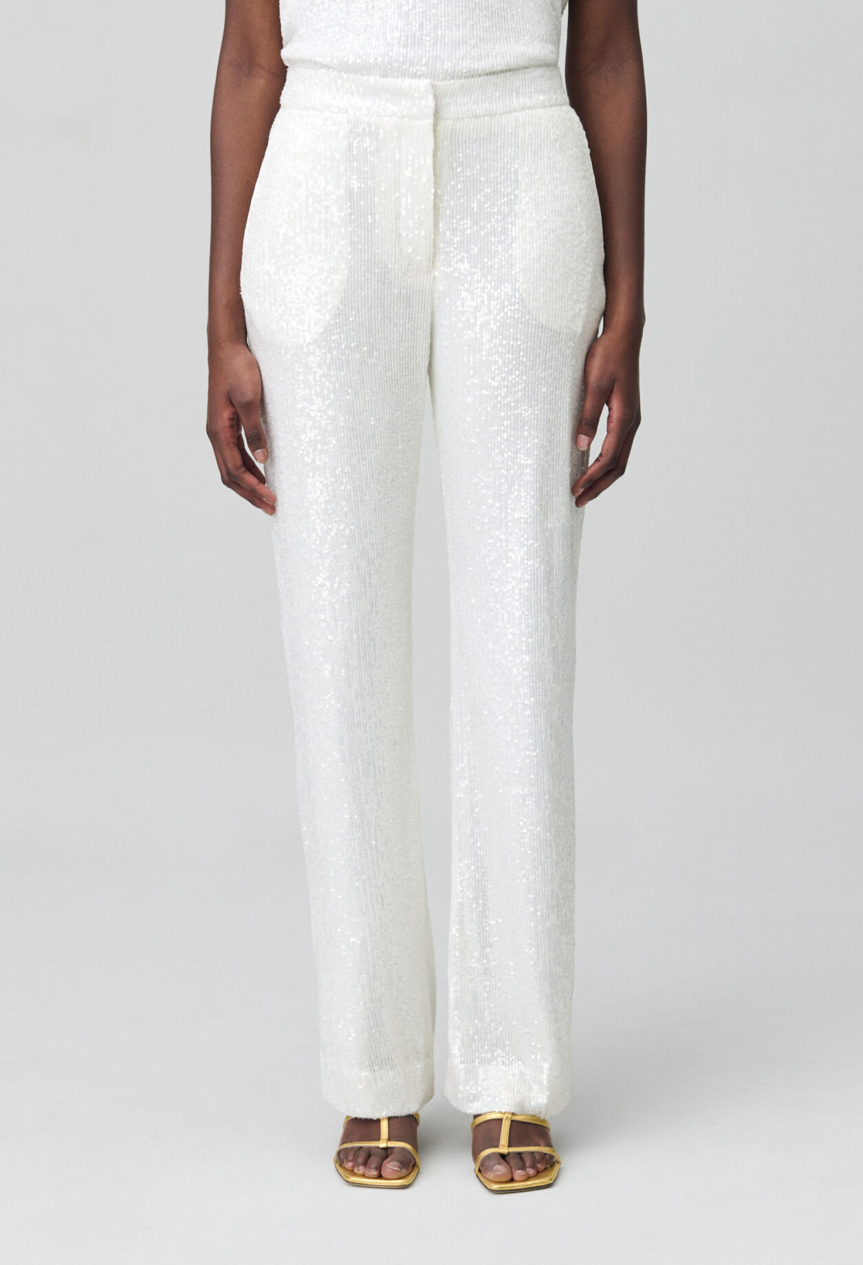 White sequinned trousers