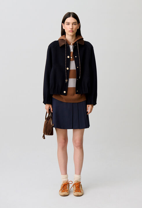 Oversized jacket with gold poppers