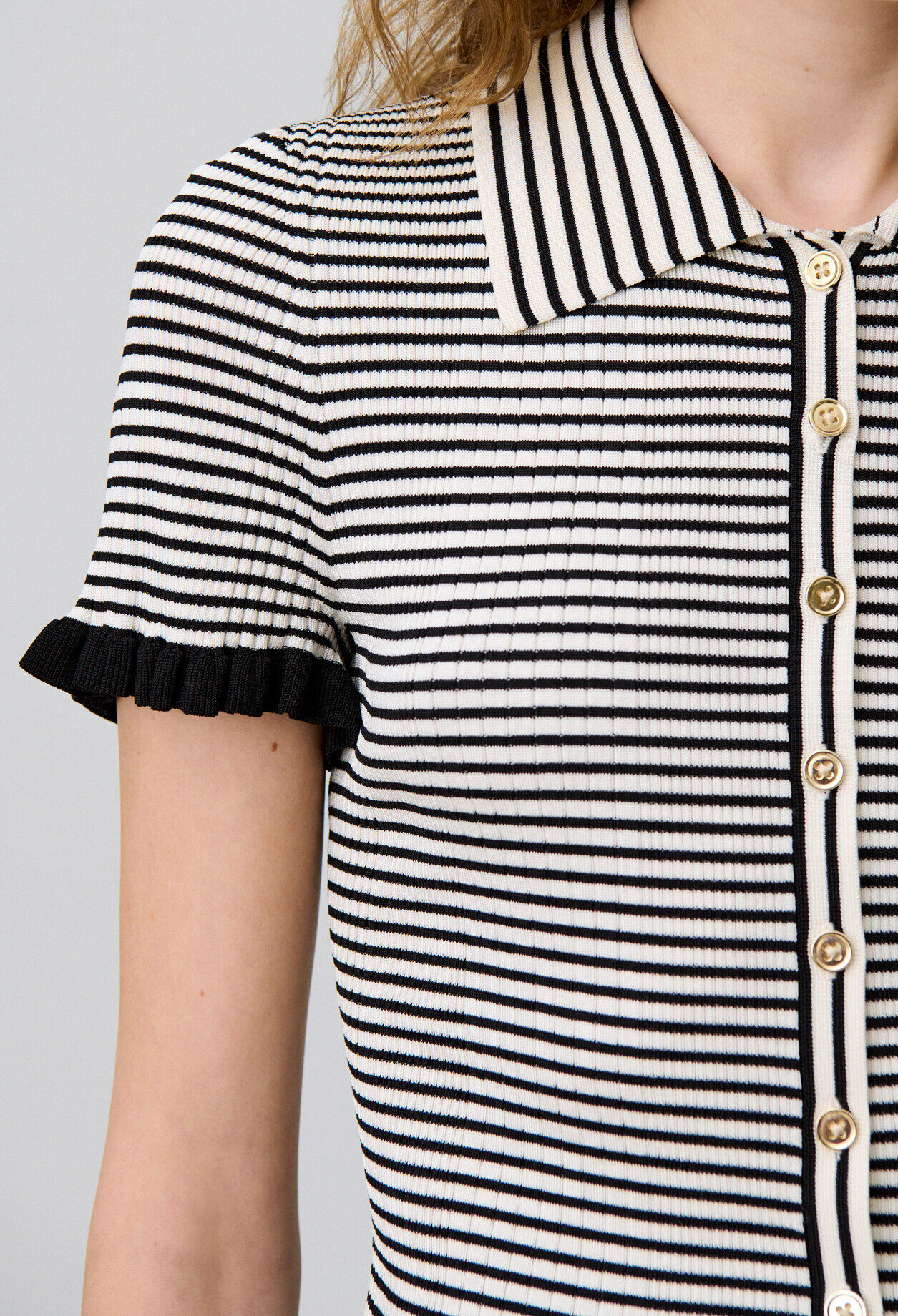 Buttoned striped polo top