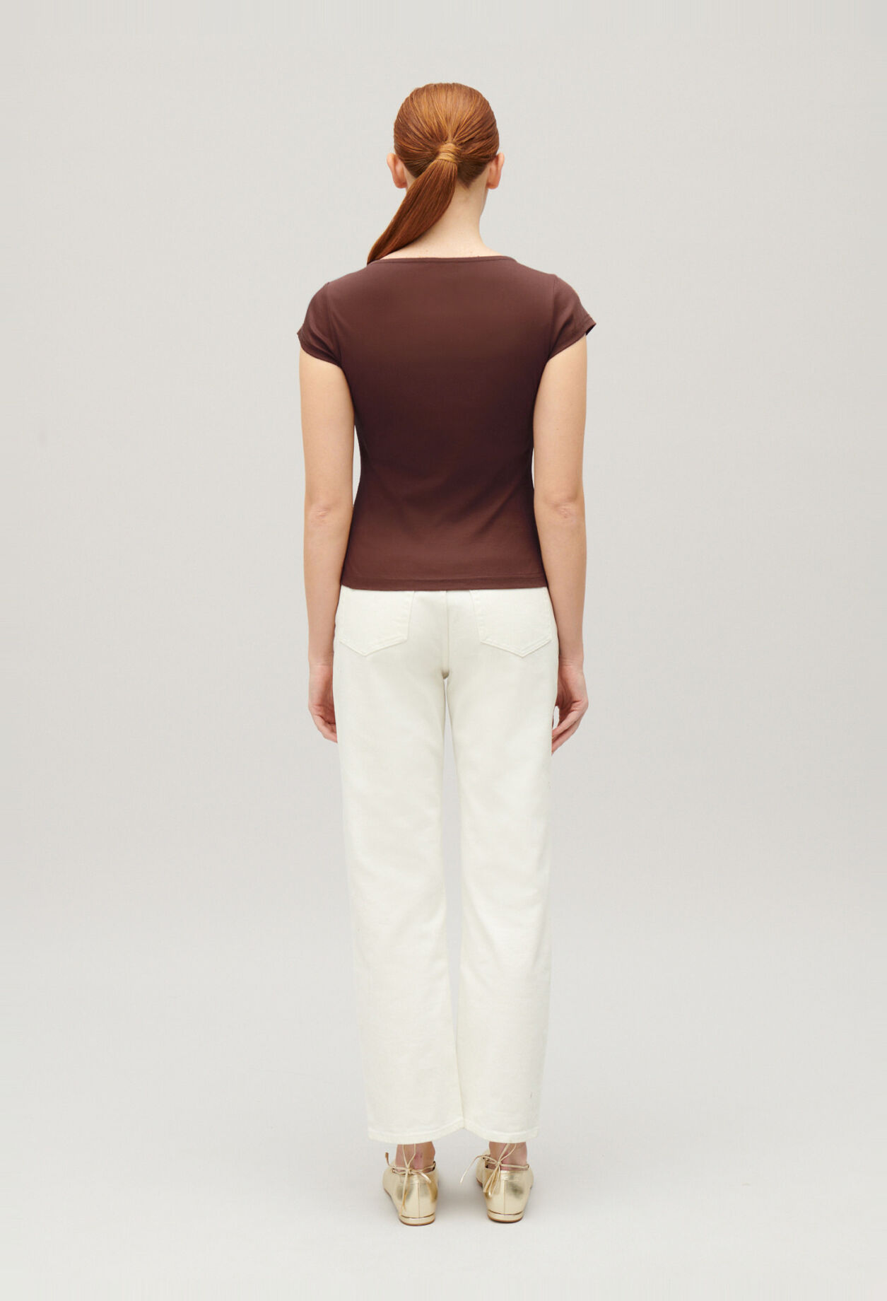 Black asymmetric button-up top