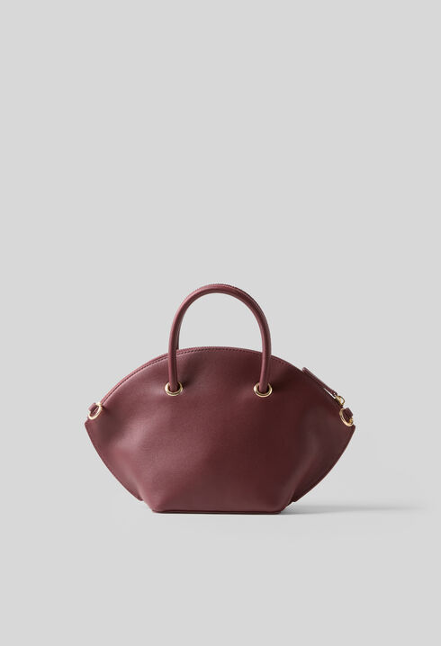 Smooth leather bag with gold rings