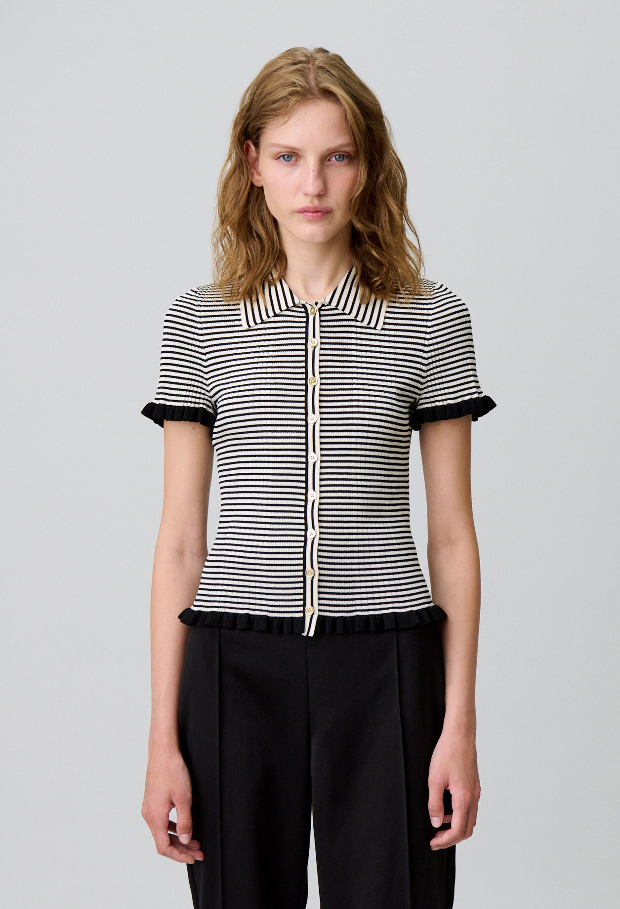 Buttoned striped polo top