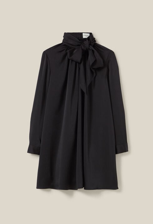 Flowing dress with black bow collar