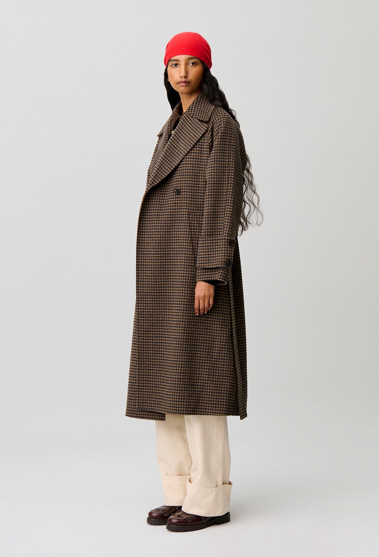 Mid-length checked belted coat