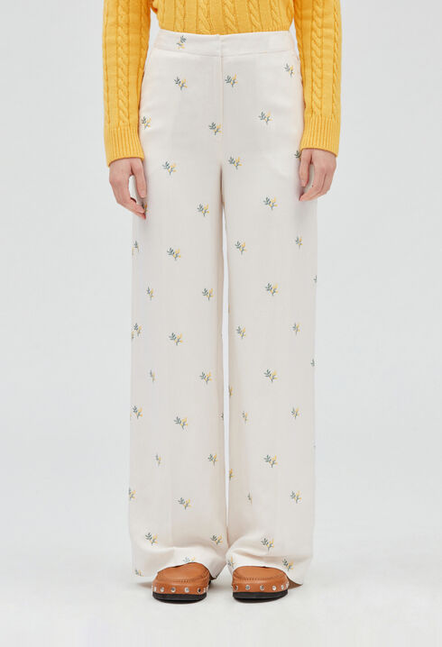 Trousers with embroidered mimosa pattern