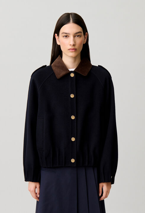 Oversized jacket with gold poppers