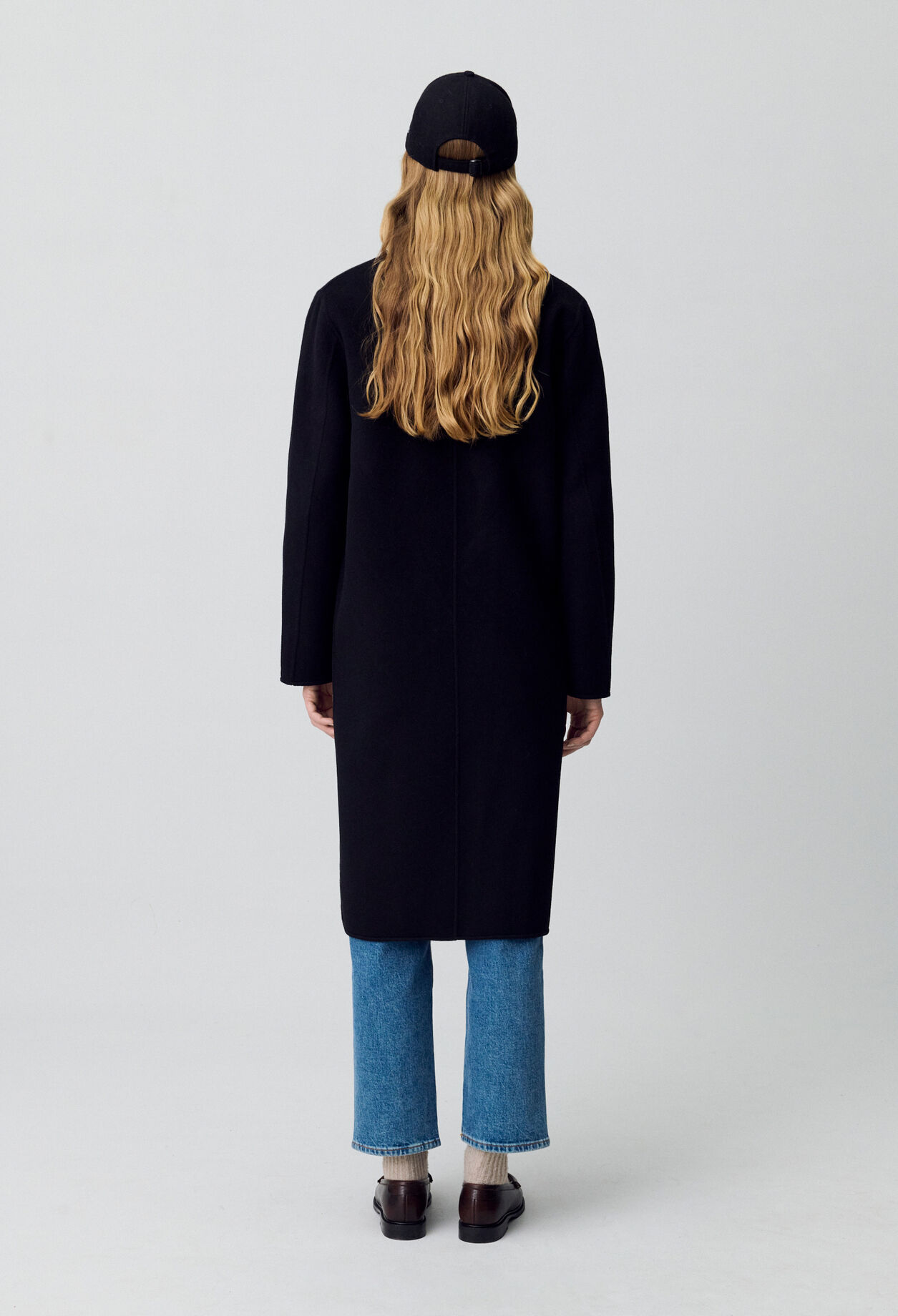 Black straight mid-length coat