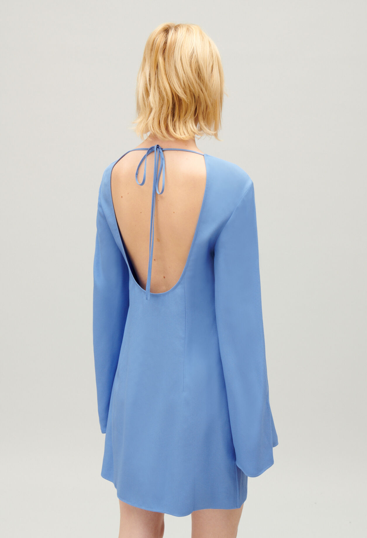 Short lavender dress with open back