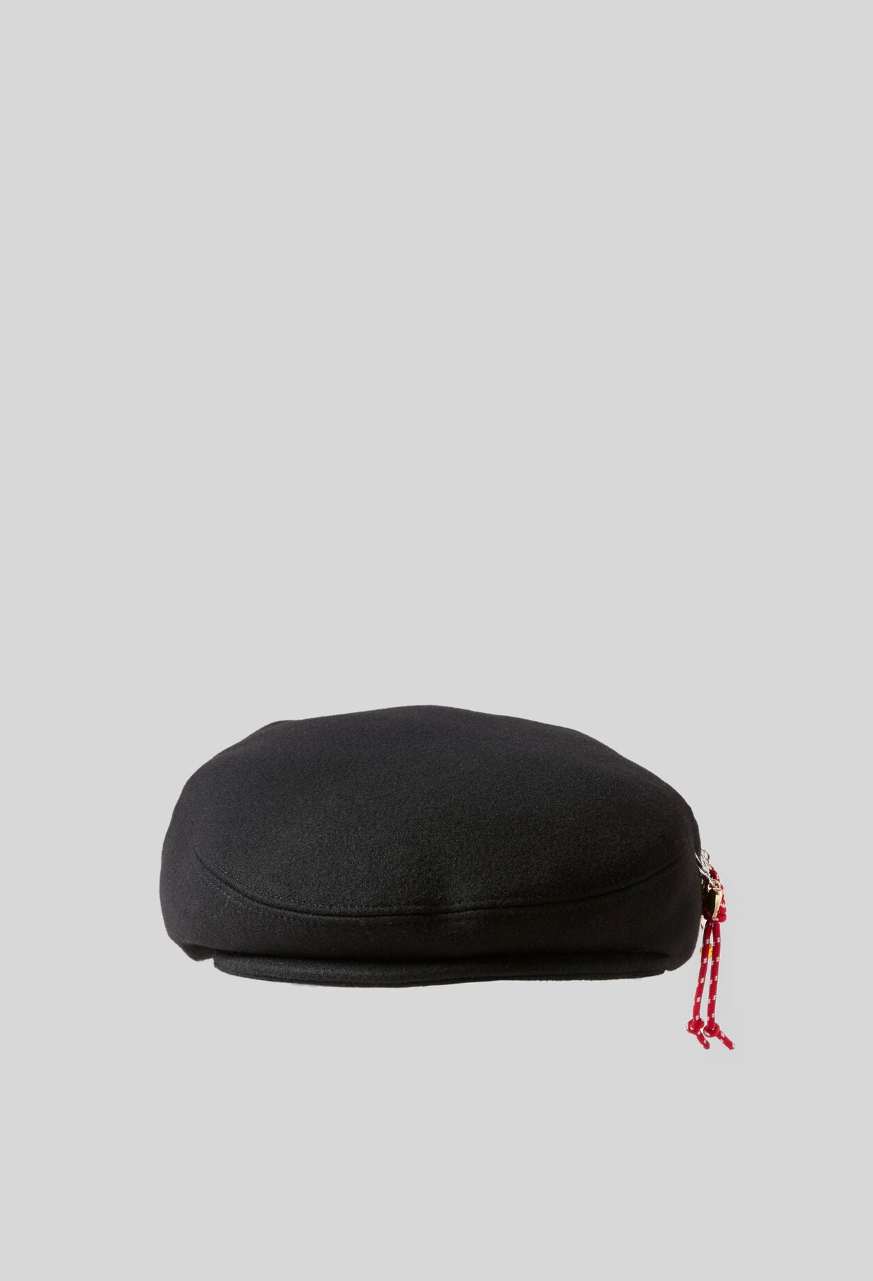 Wool beret with metal brooch