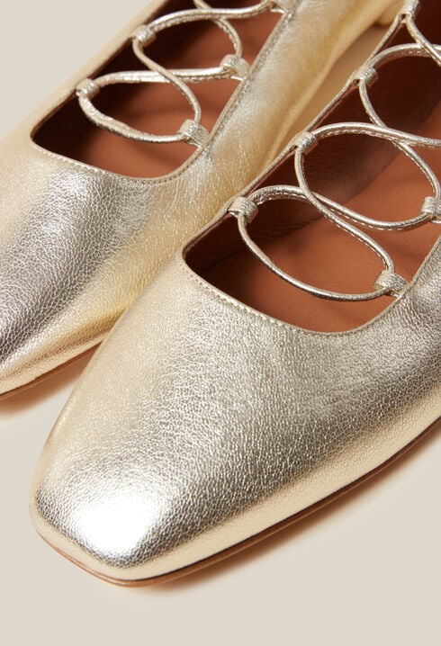 Gold leather ballet pumps
