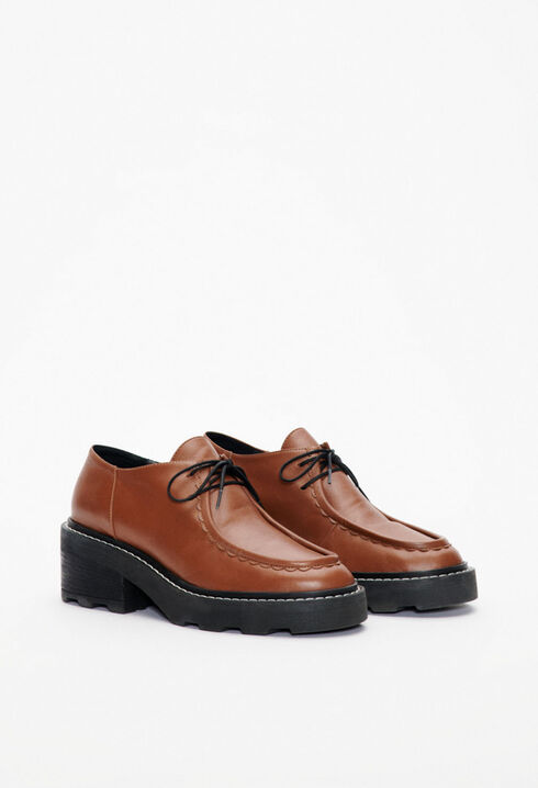 Heeled brown derbies