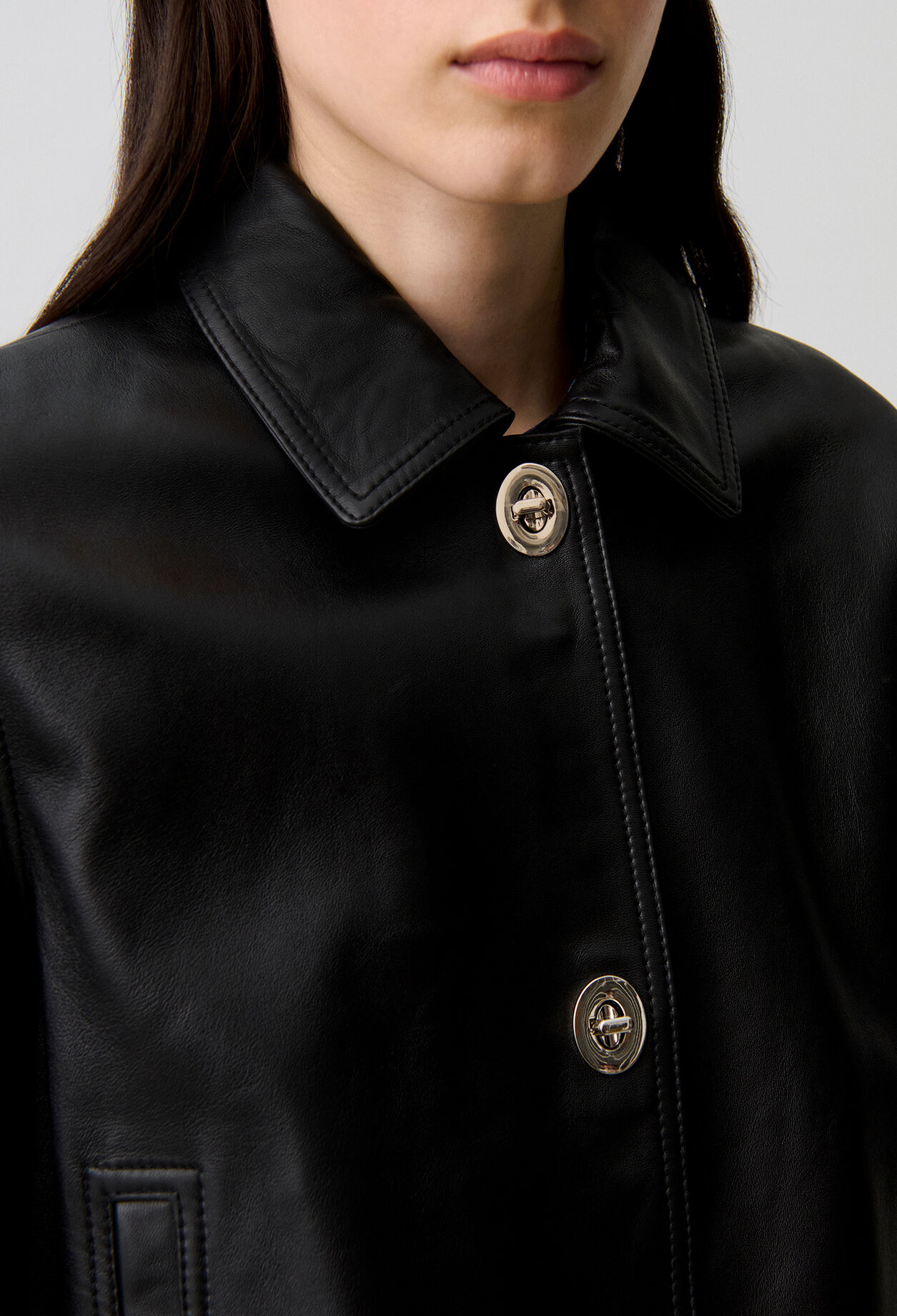 Short black leather jacket