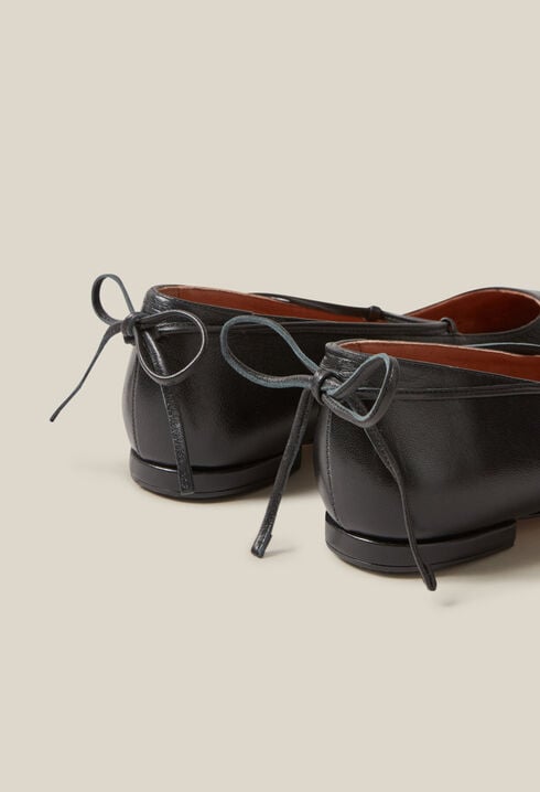 Black leather ballet pumps