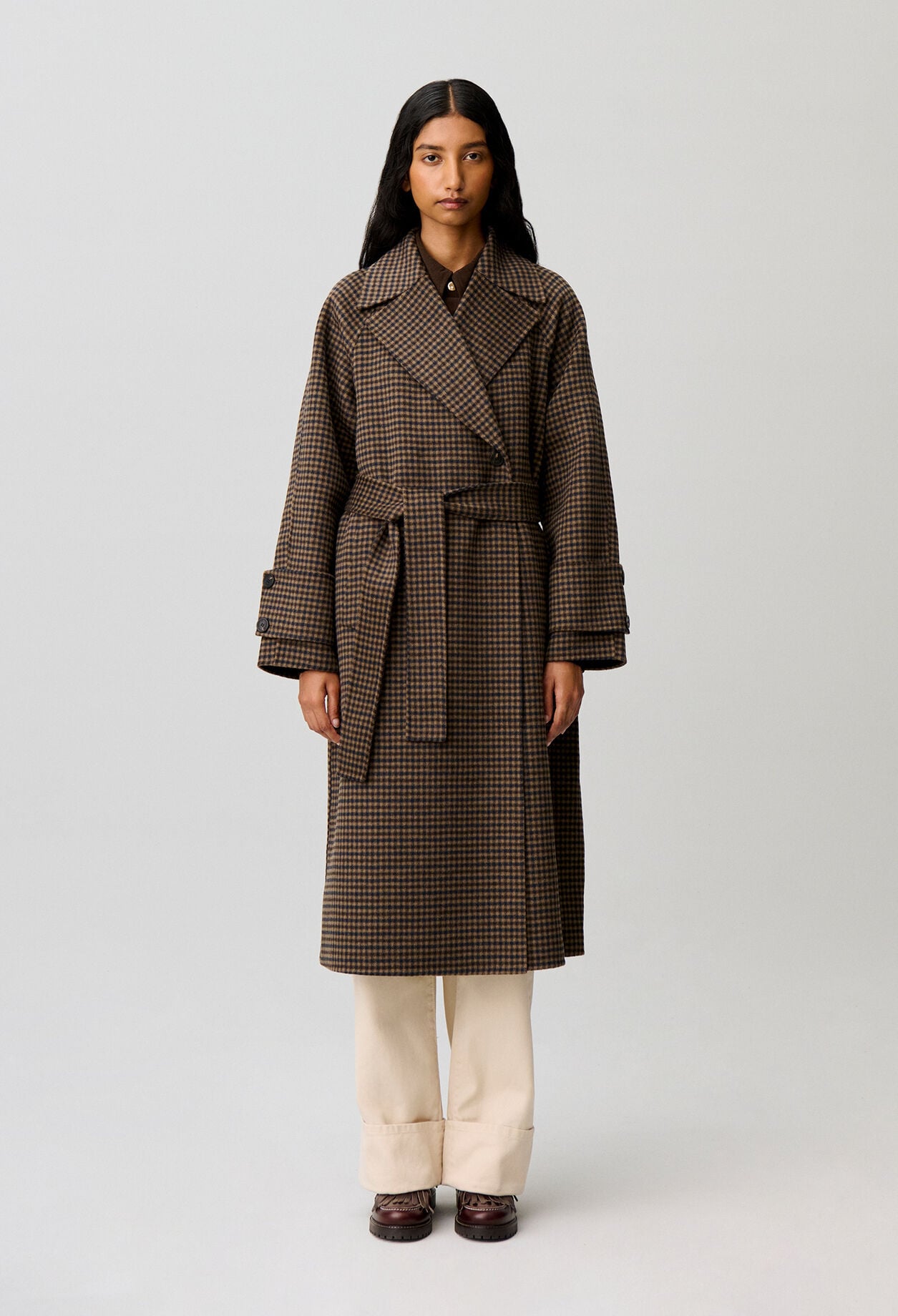 Mid-length checked belted coat