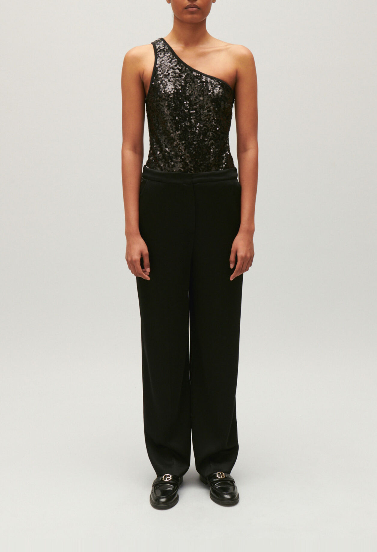 Black asymmetric bodysuit with sequins