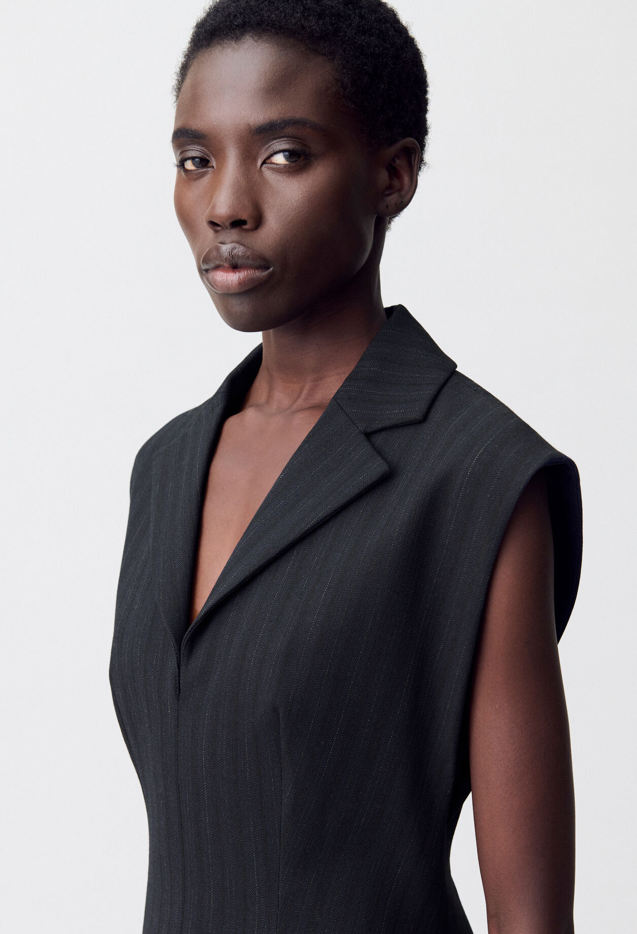 Short fitted pleated dress