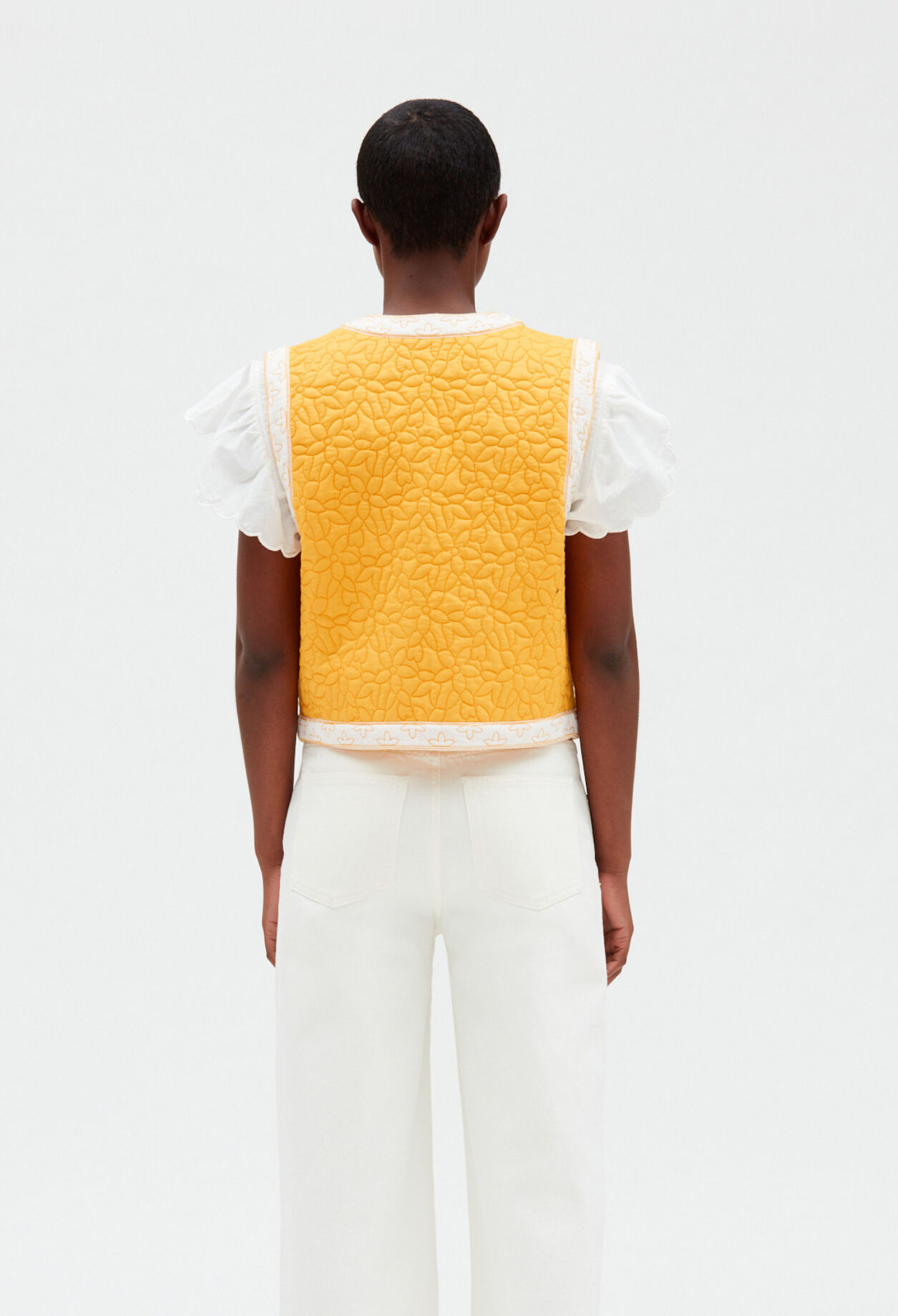 Sleeveless bouty-braid jacket