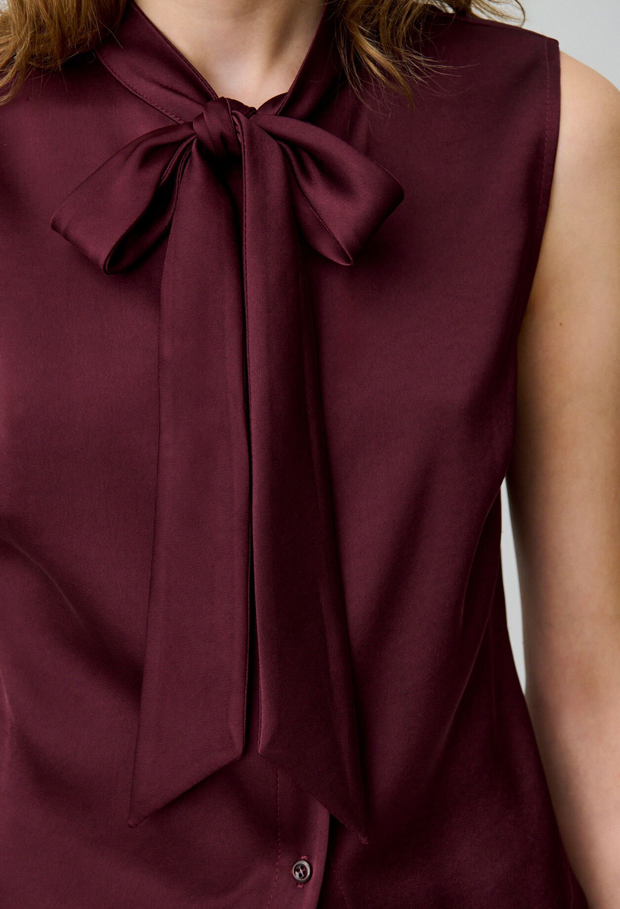 Sleeveless satin blouse