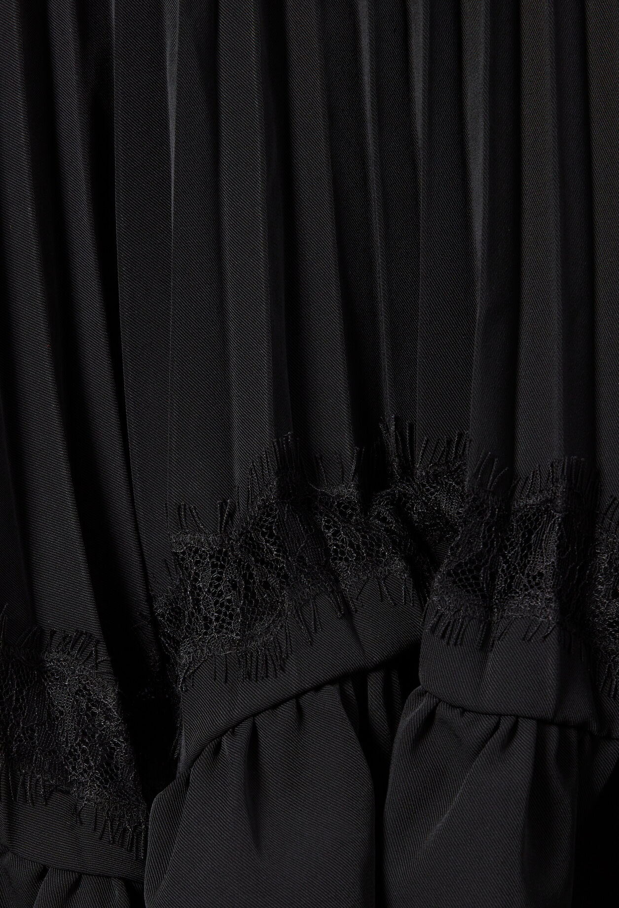 Asymmetric lace skirt