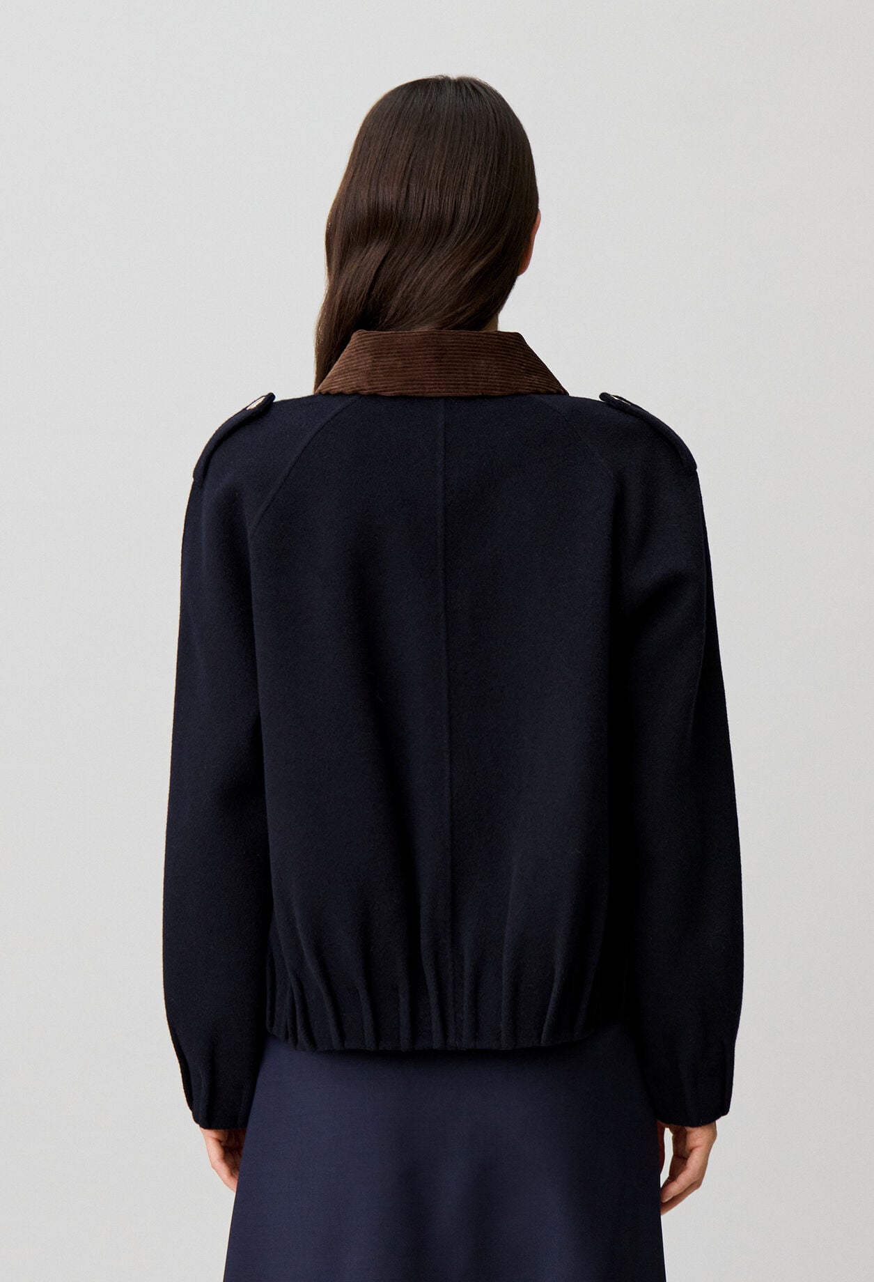 Oversized jacket with gold poppers