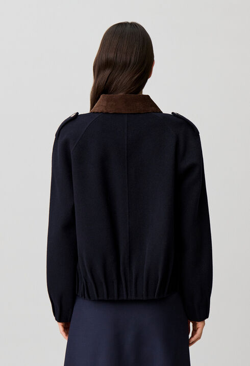 Oversized jacket with gold poppers