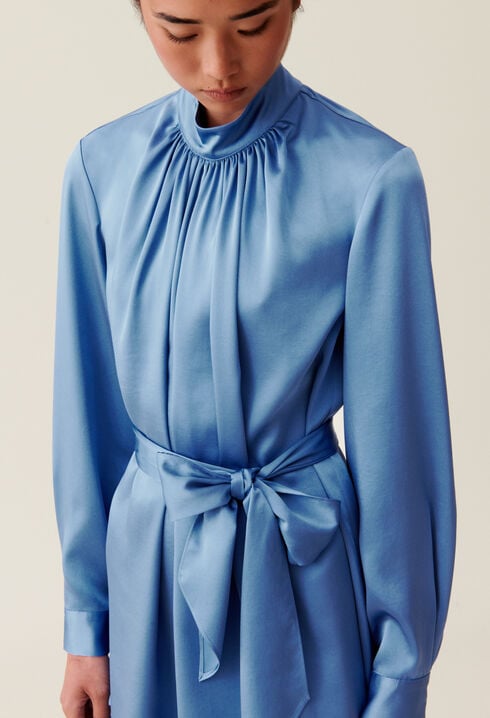 Flowing dress with black bow collar