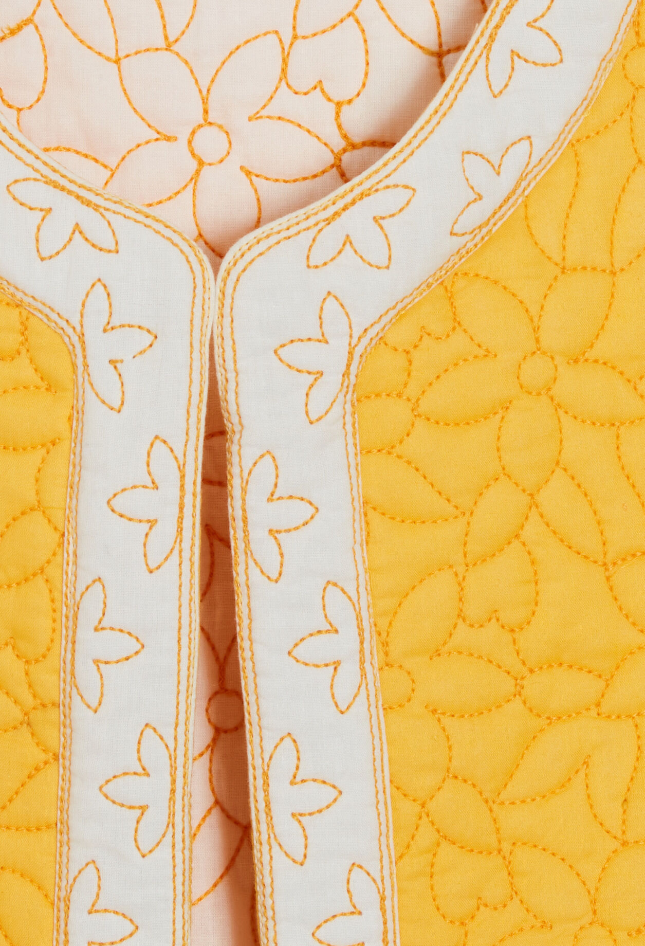 Sleeveless bouty-braid jacket