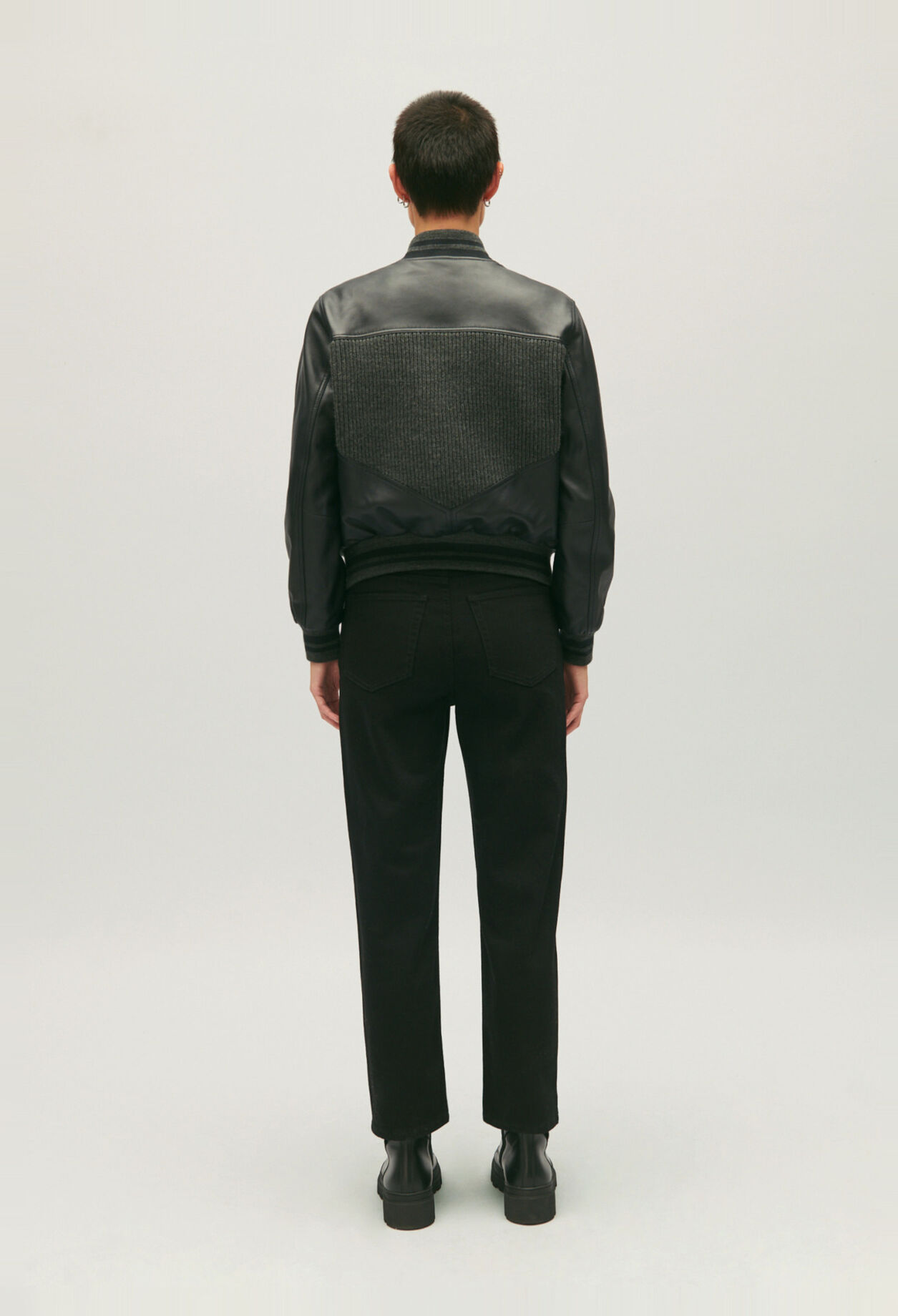 Dual-material leather and knitted jacket