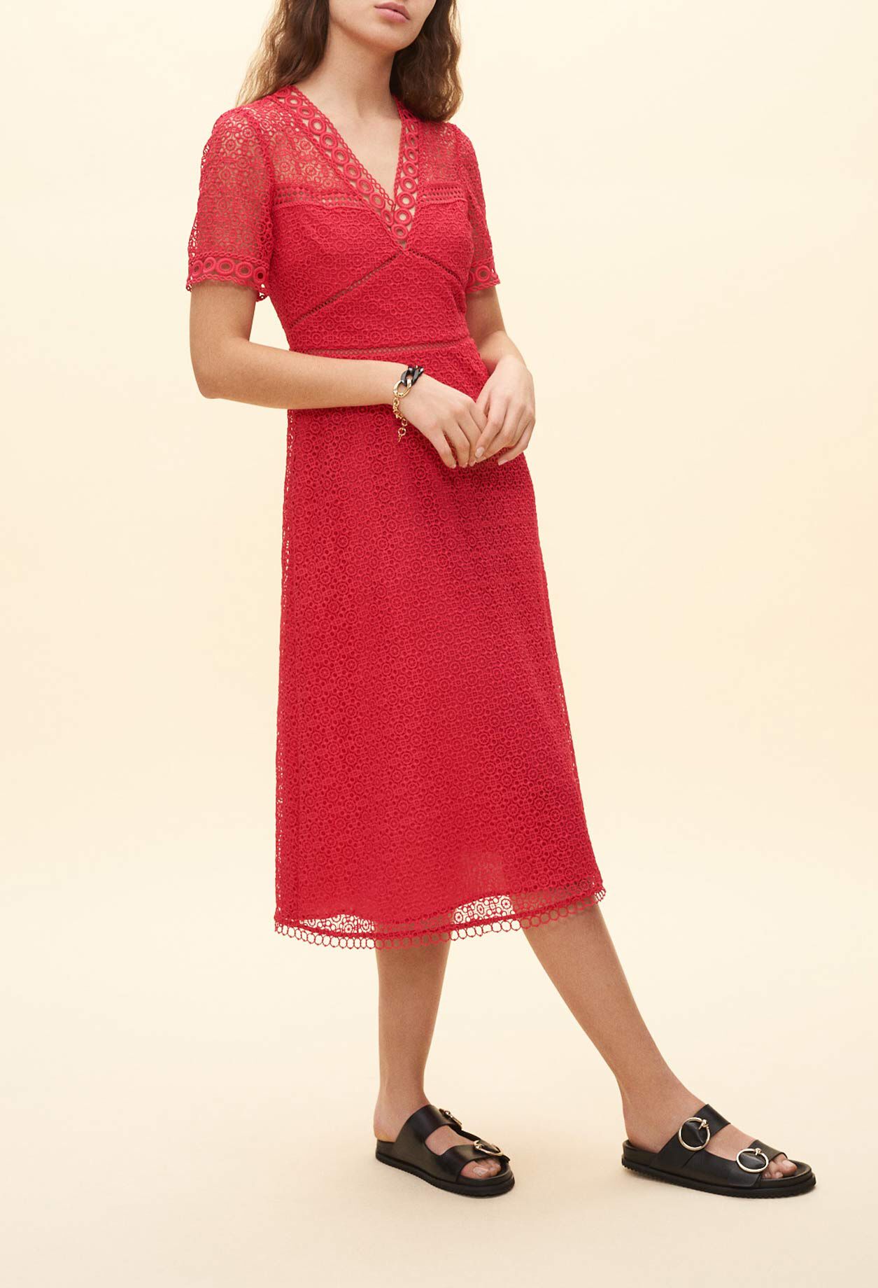 Long dress with red lace pattern Long dress with red lace pattern
