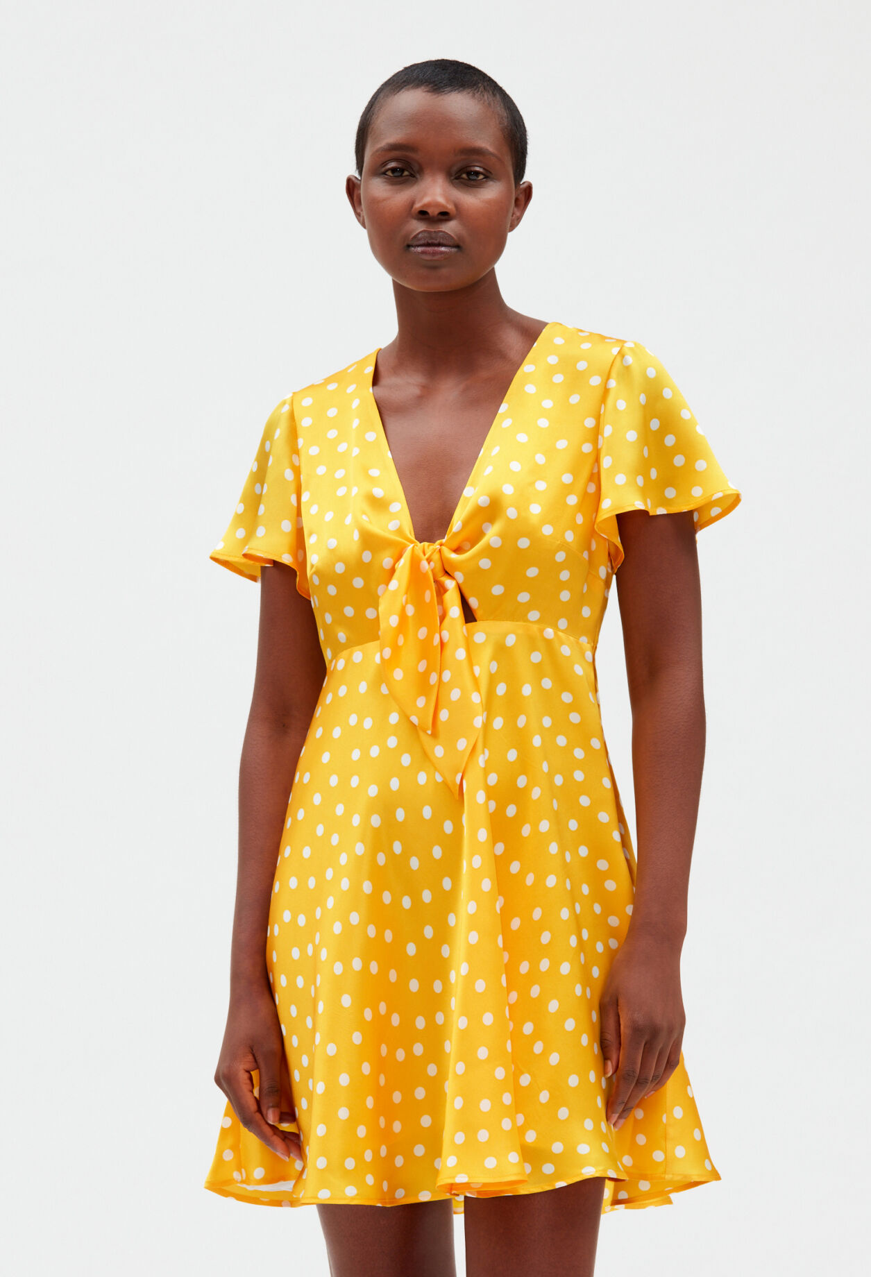 Short yellow flowing dress