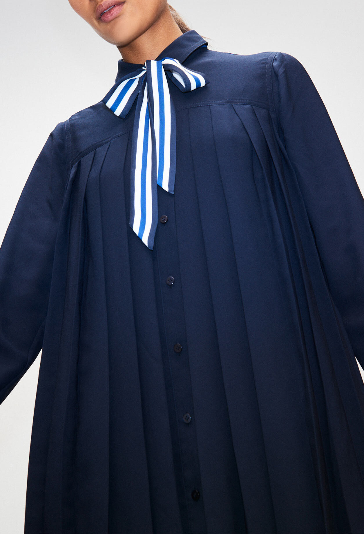 Plated shirt dress w/ lavallière detail