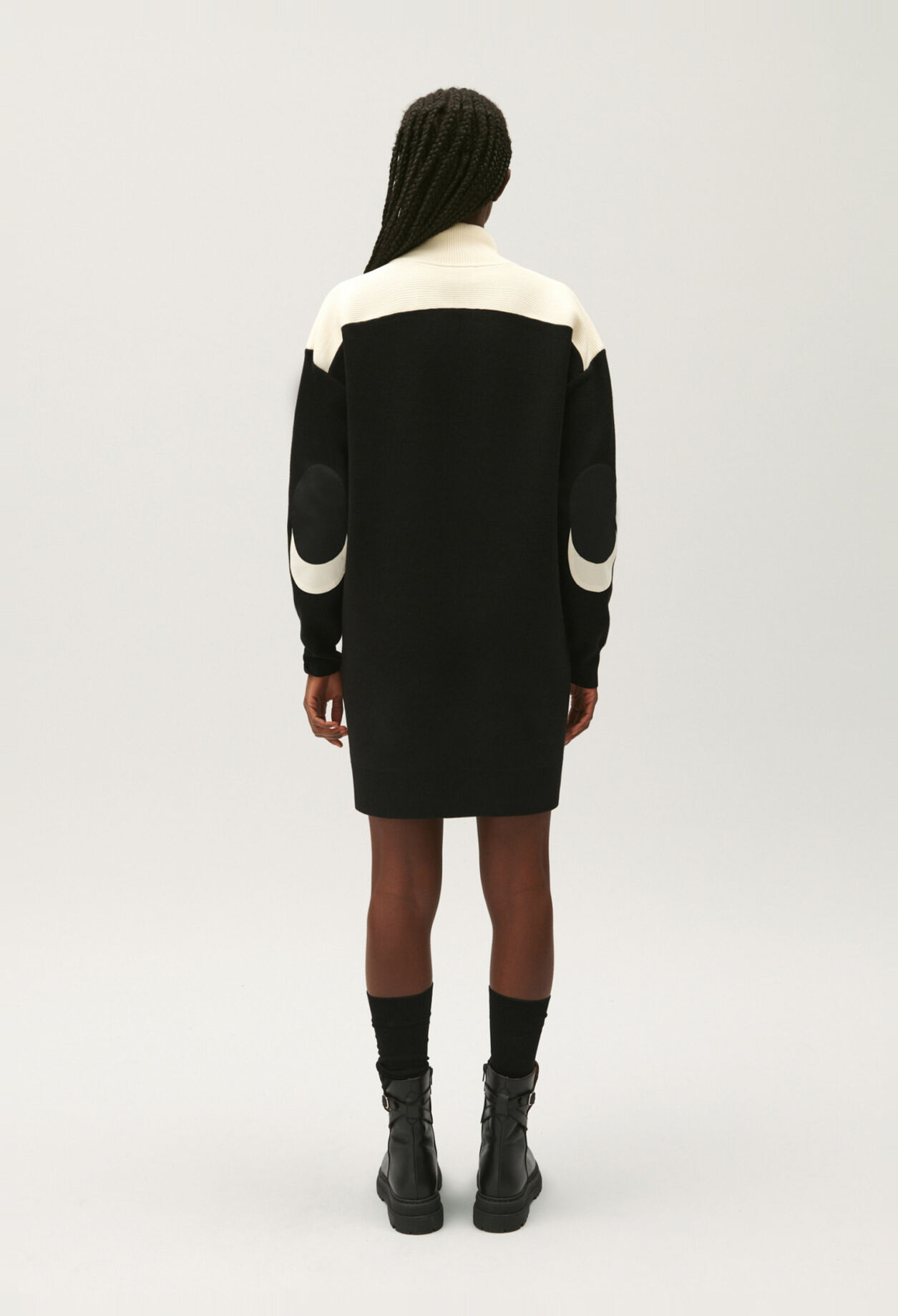 Black jumper dress with zipped rollneck