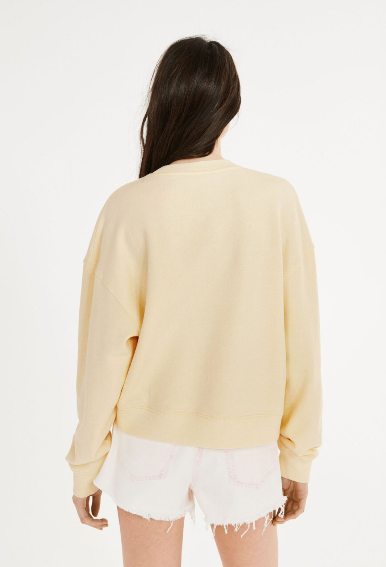 Pale yellow sweatshirt