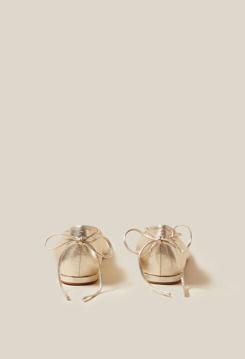 Gold leather ballet pumps