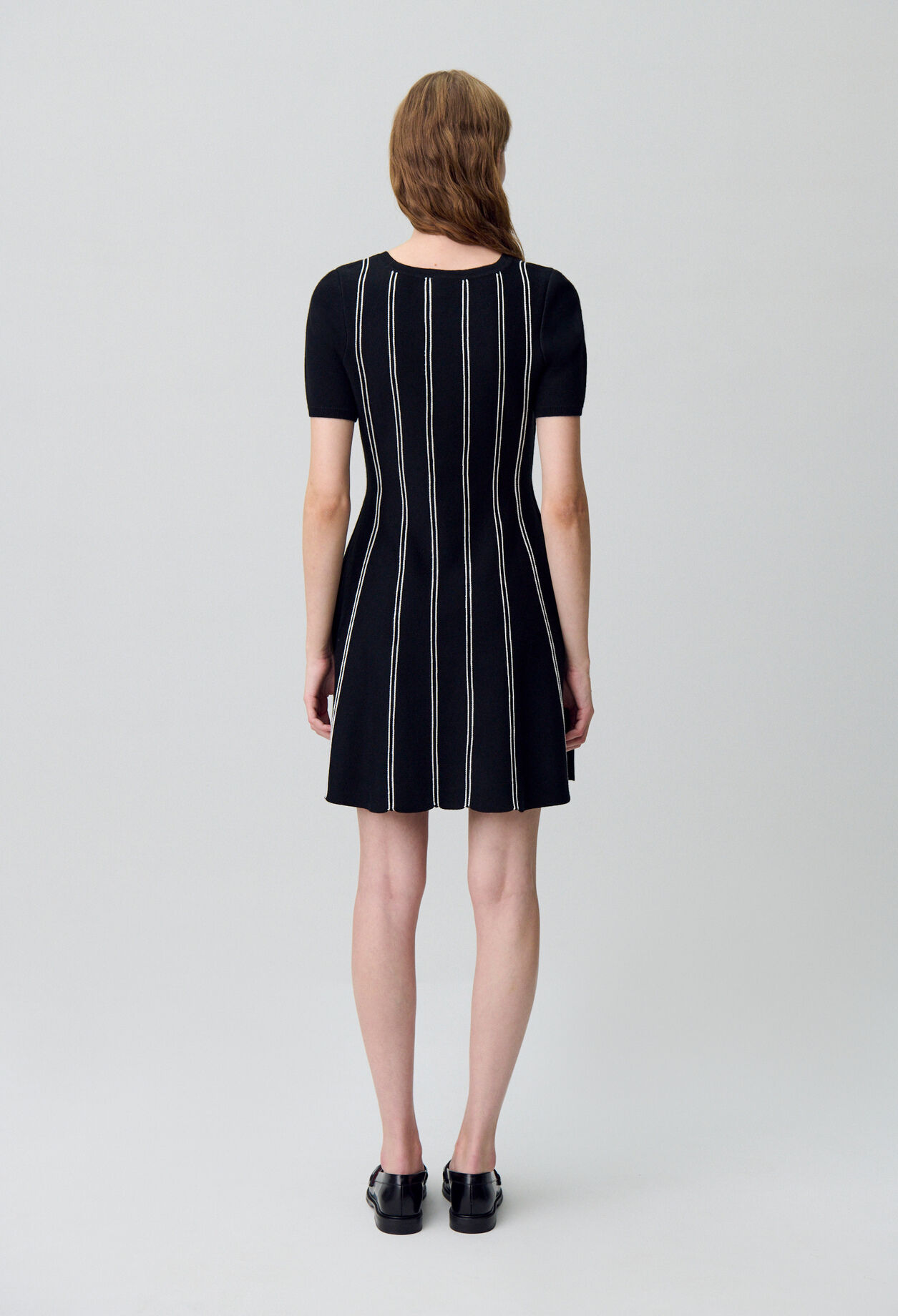 Skater-style short knit dress Skater-style short knit dress