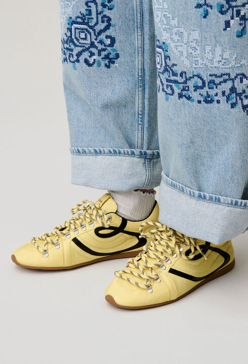 Light yellow swing trainers