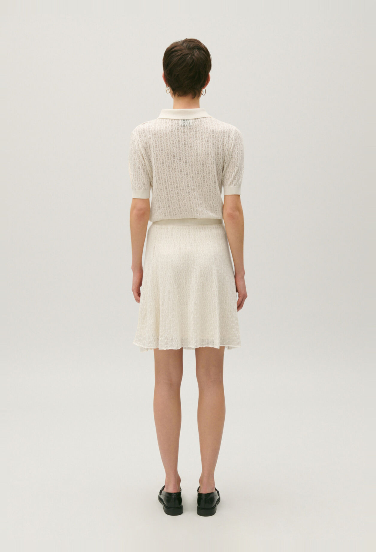 Flowing ecru fine-knit skirt