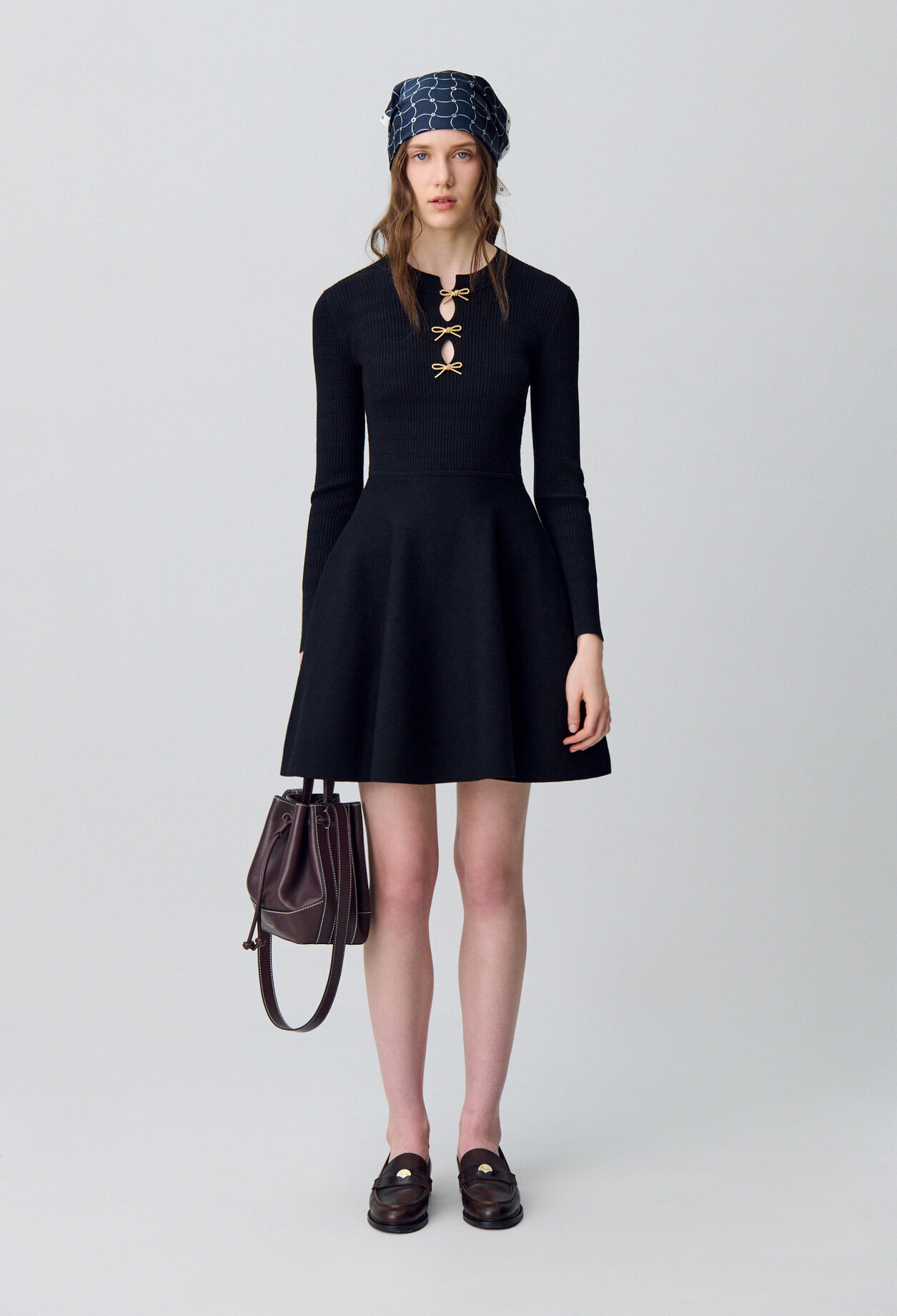 Short knitted dress with knots Short knitted dress with knots