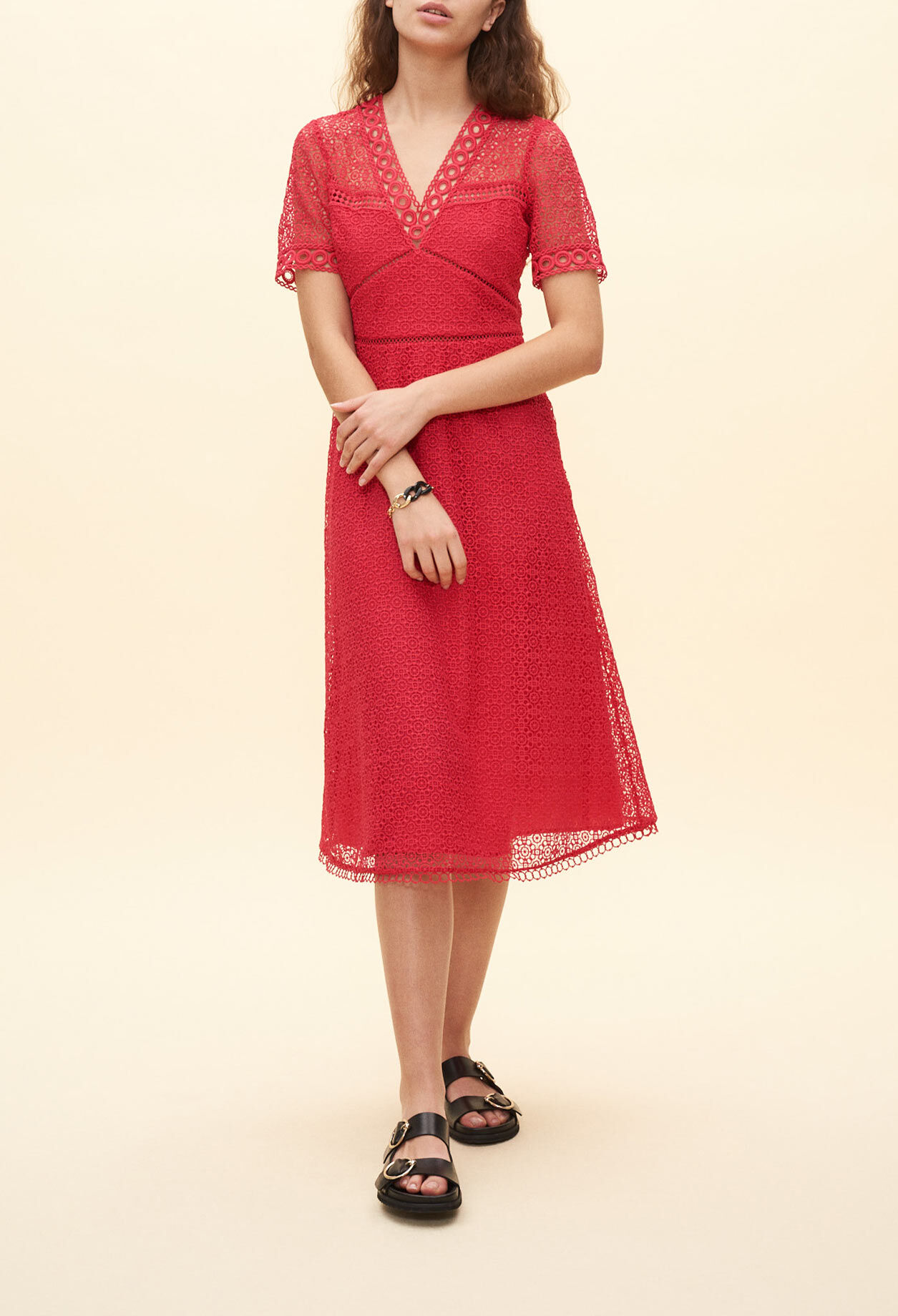 Long dress with red lace pattern Long dress with red lace pattern