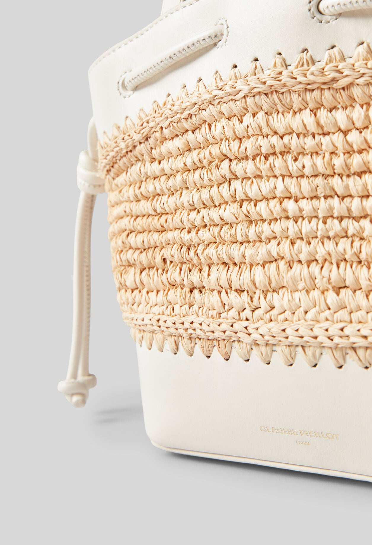 Raffia and leather basket