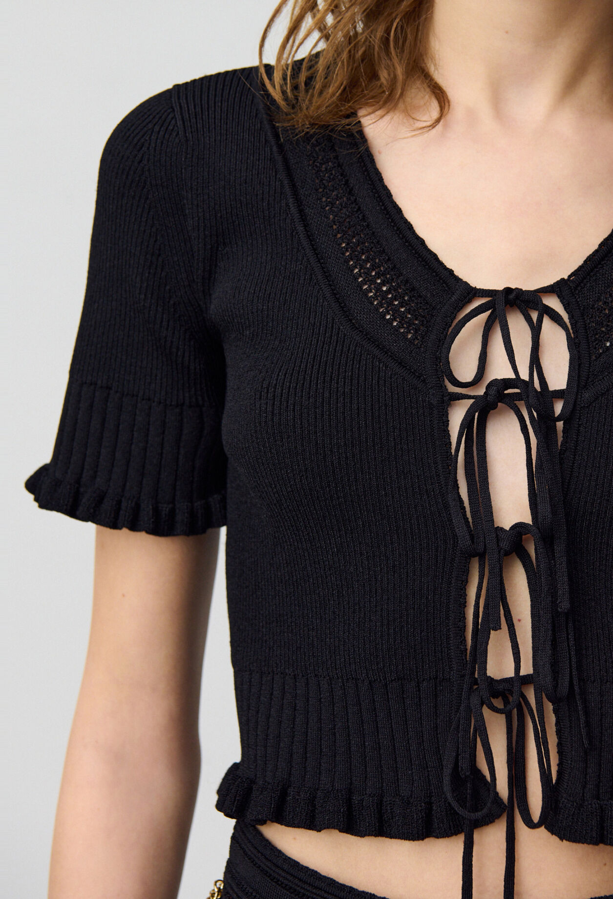 Fine knit top with bows