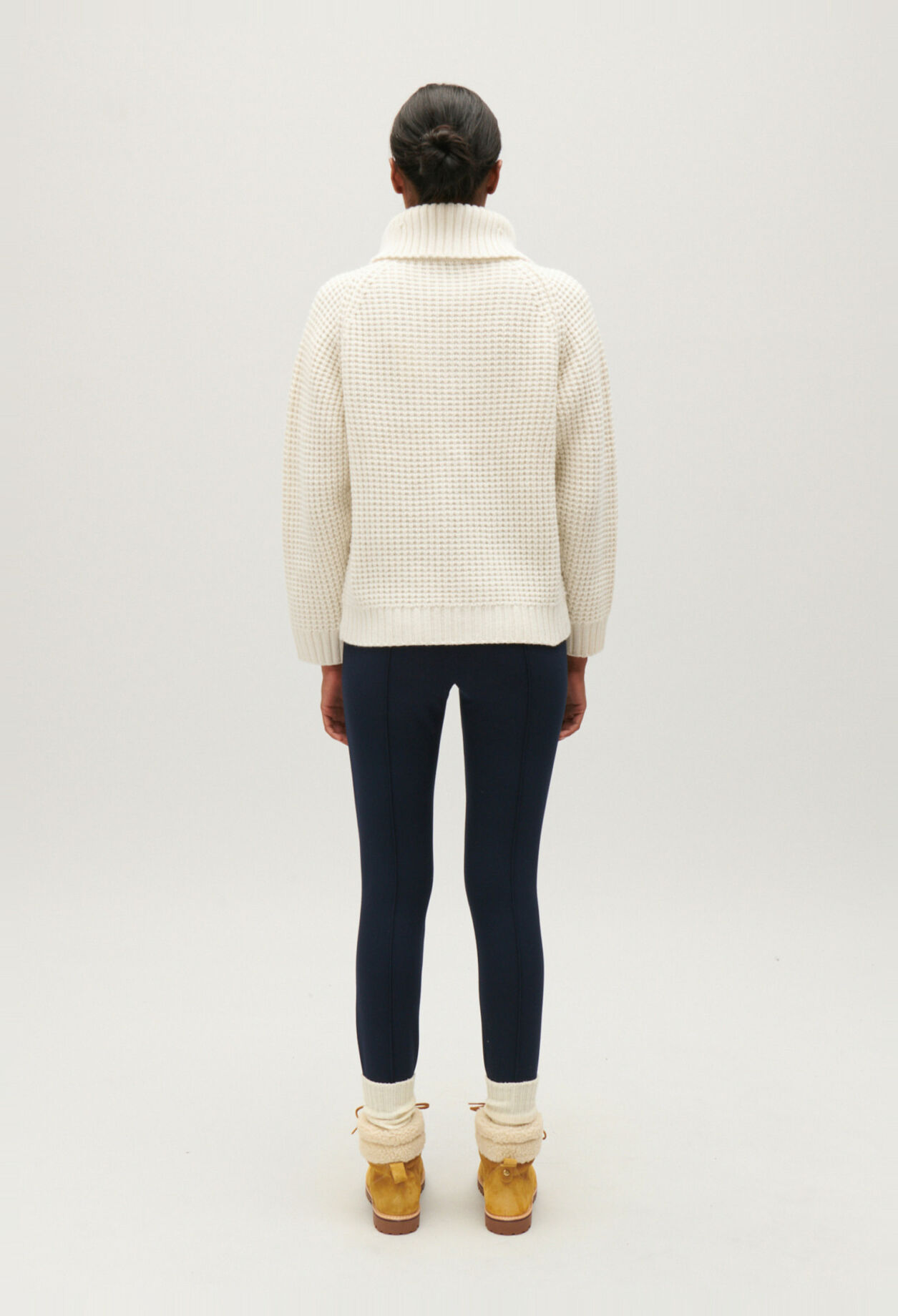 Two-tone knitted jumper zipped rollneck