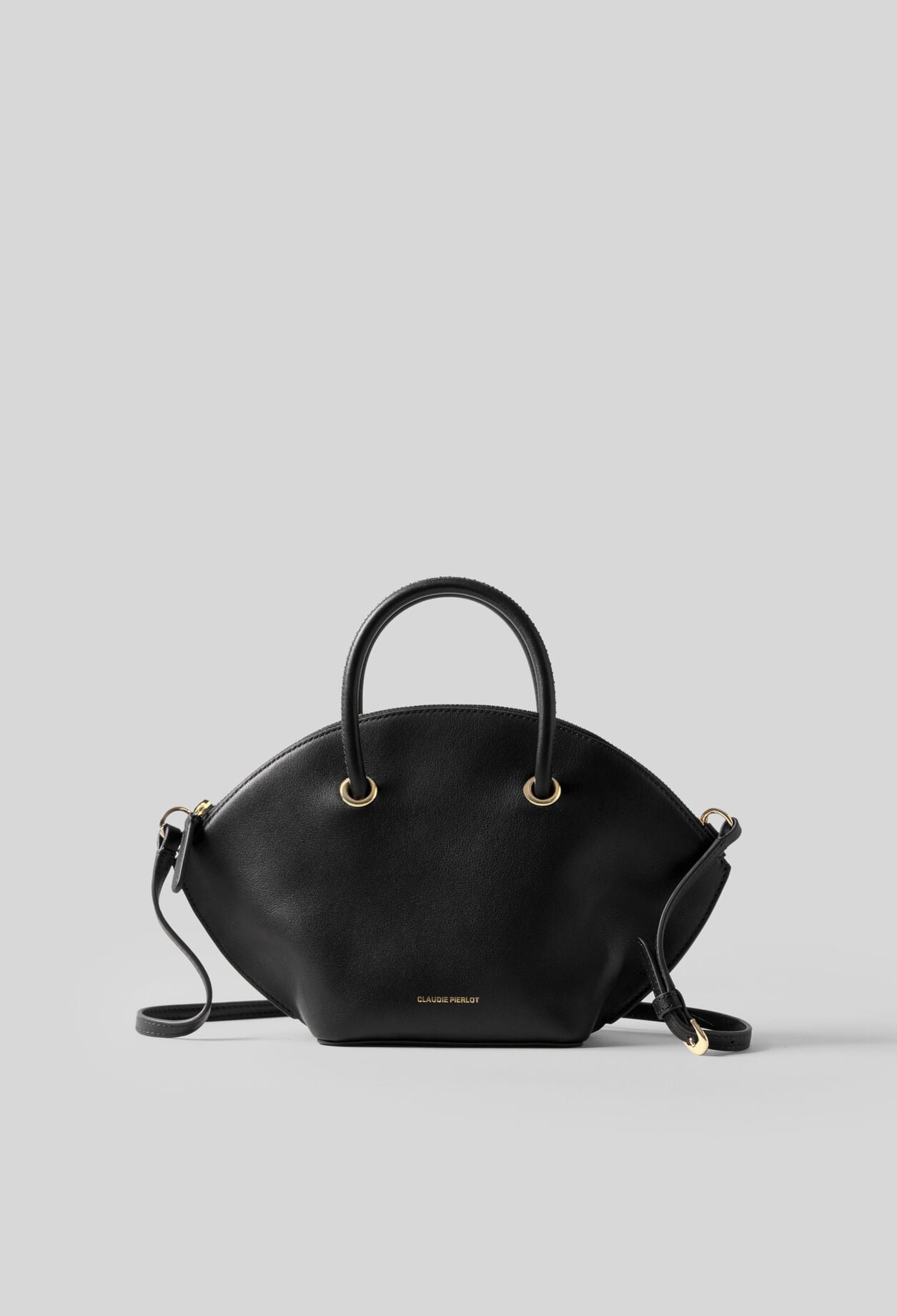 Smooth leather bag with gold rings
