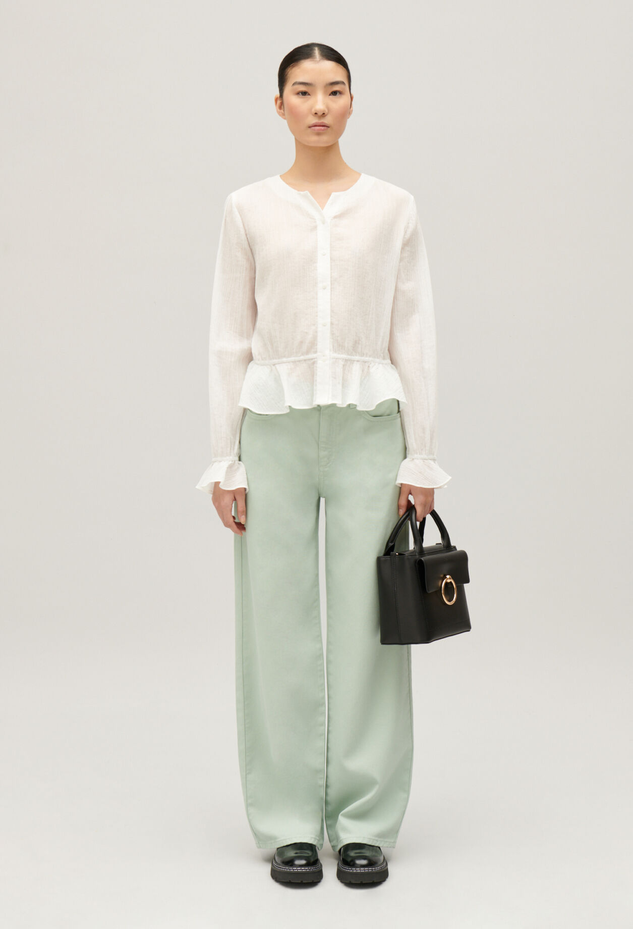 Ruffled cream basque shirt