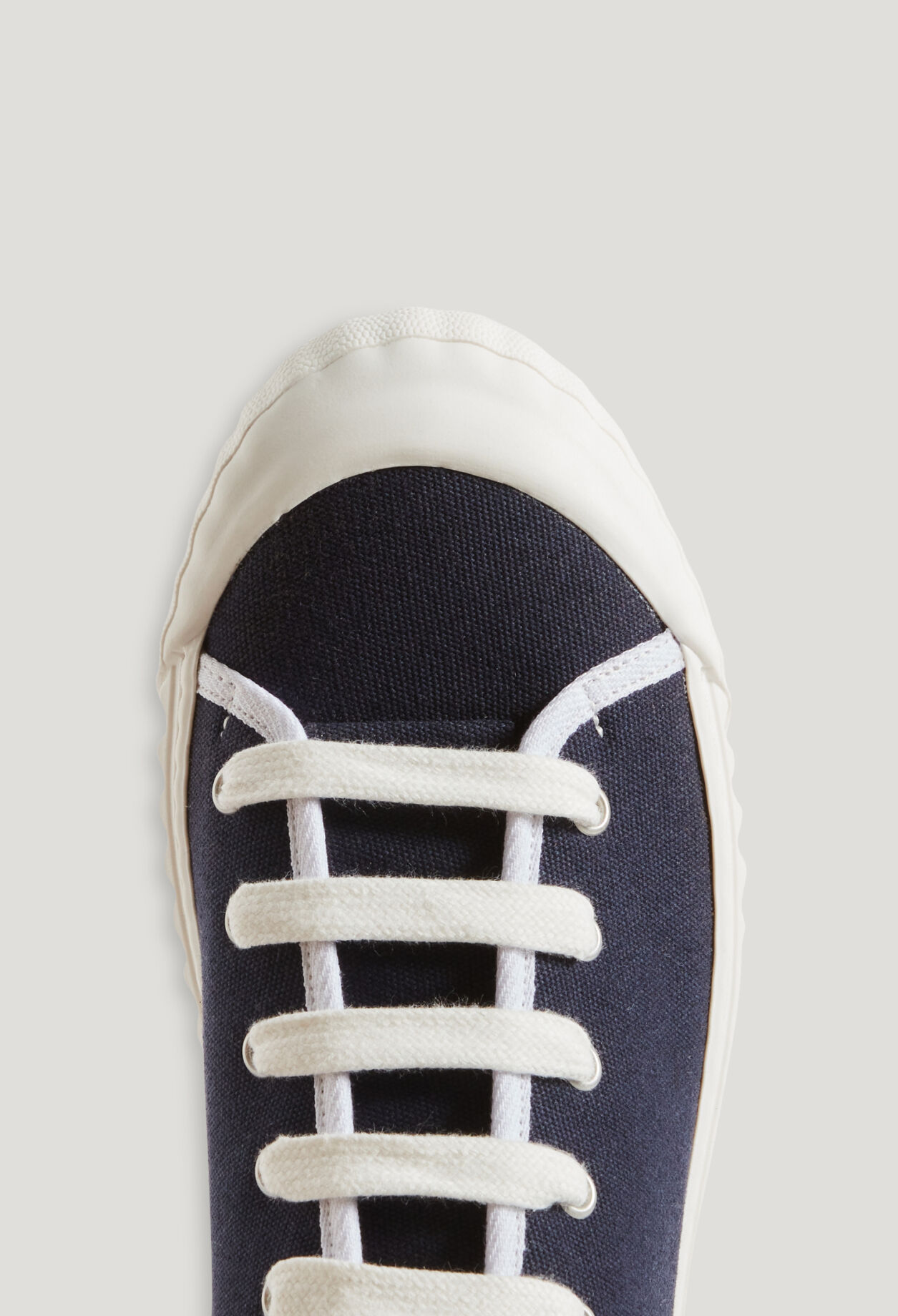 Navy canvas tennis shoes