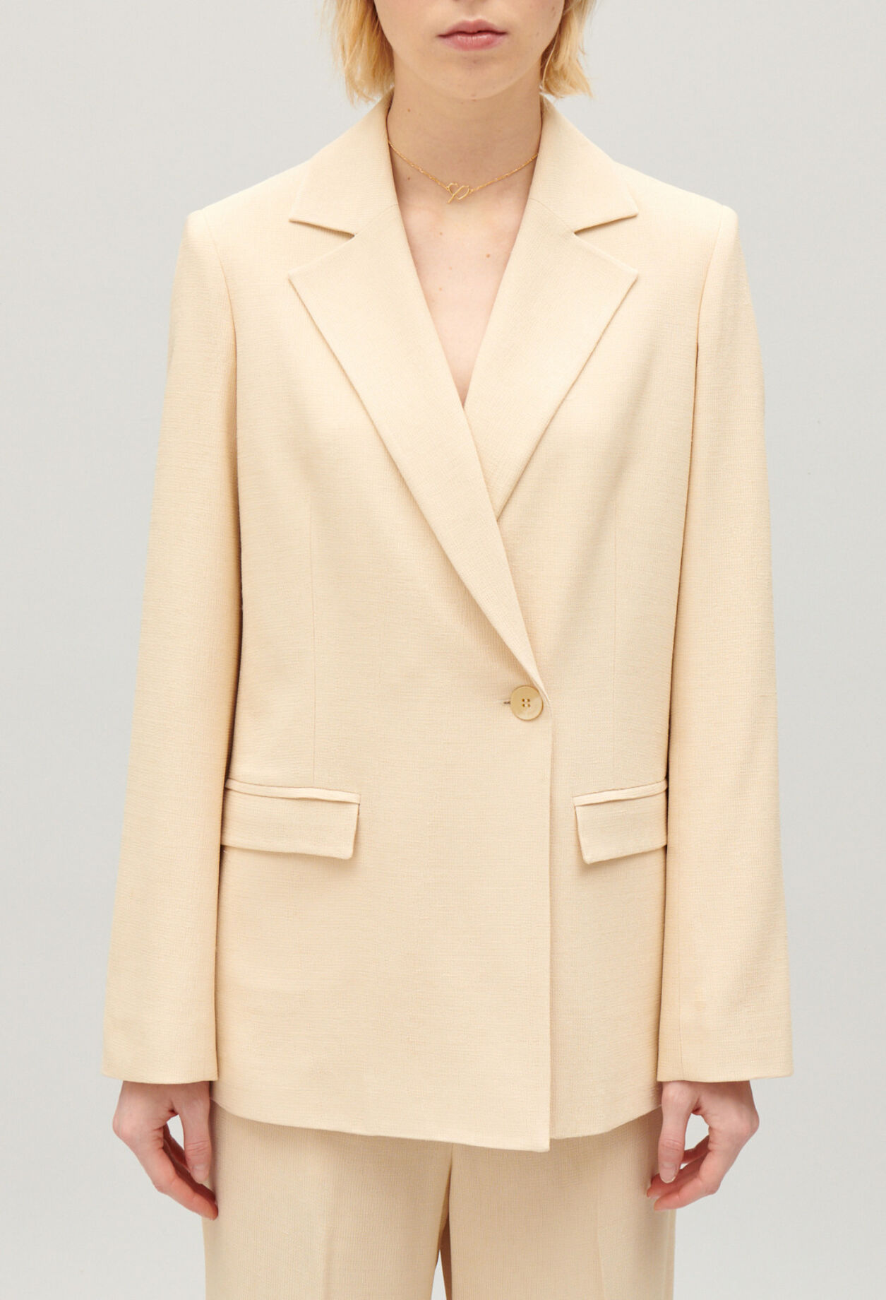 Beige textured suit jacket