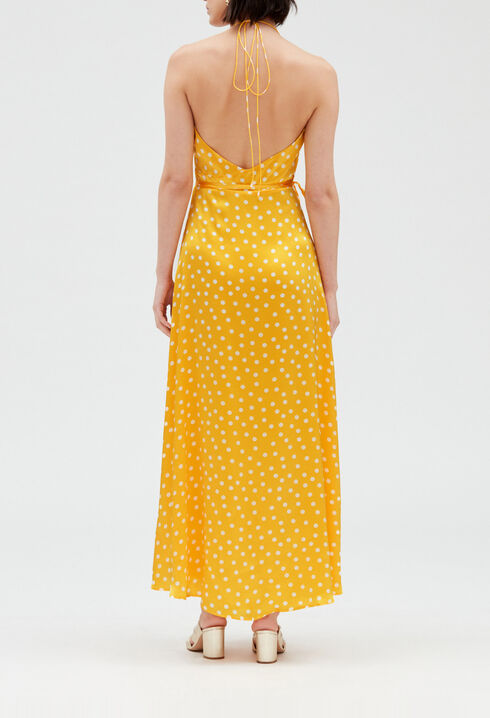 Long yellow silk wraparound dress.