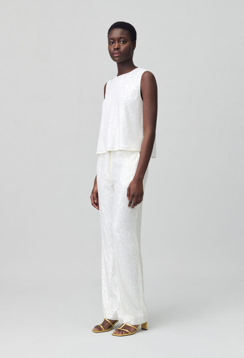 White sequinned trousers
