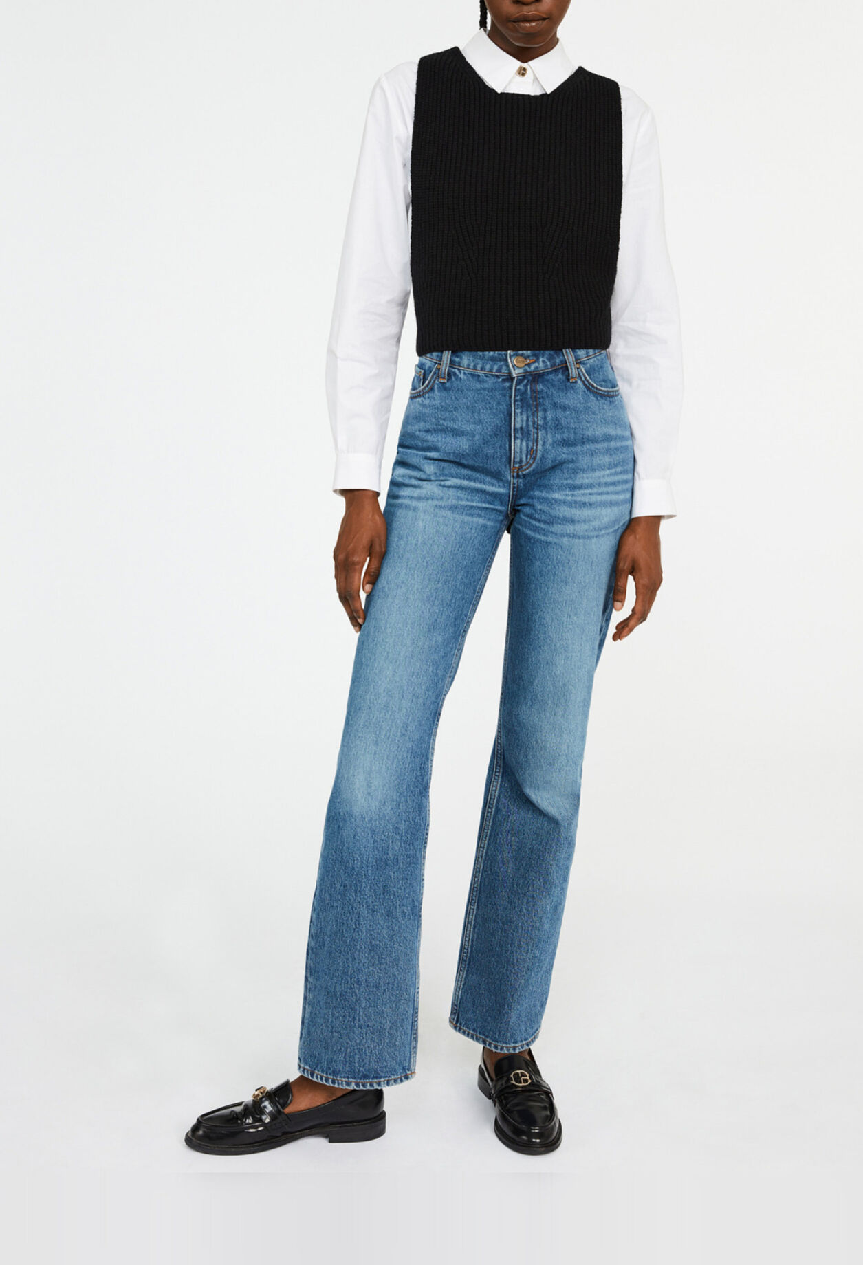 Pull sans manche croisé dans le dos