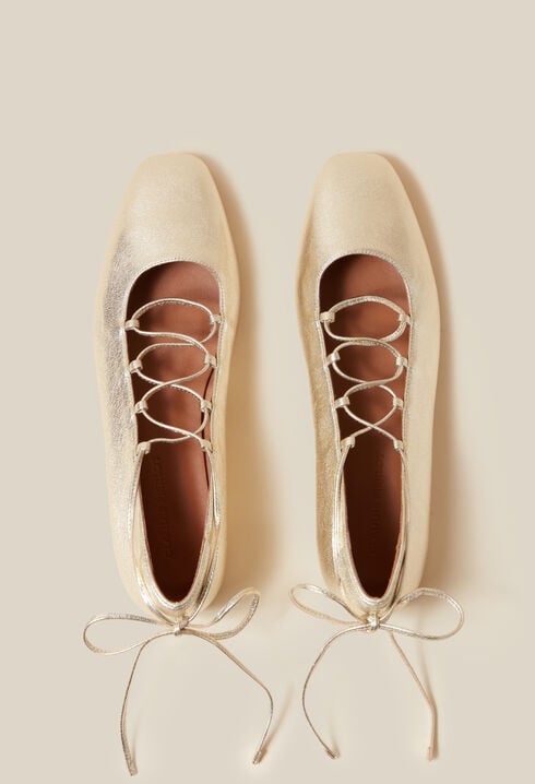 Gold leather ballet pumps